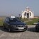 Two taxis parked outside the Italian Chapel in the Orkney Islands